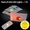 Pack of (24) Flat LED Disc Golf Lights - Assorted Colors + Sun King Sticker